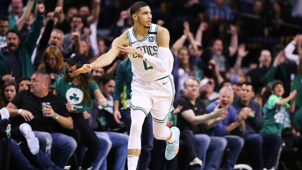 jayson_tatum_loads_up_the_3_cannon.jpg